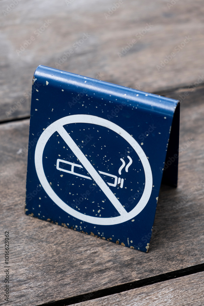 No smoking sign on wooden table