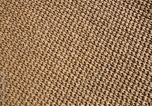 Beige raffia crochet texture. Crocheted bags, clutches, hats, wallets.