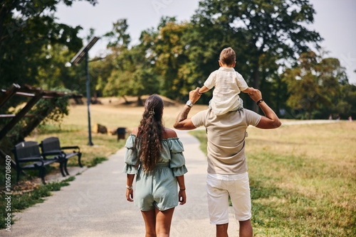 Rear View Of Family Walks