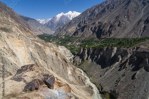 Scenic landscape view of Bagrot valley with snow-capped Diran peak in background, Gilgit, Gilgit-Baltistan, Pakistan photo