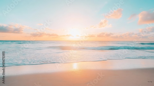 Tranquil Beach Sunset with Soft Waves and Pink Clouds