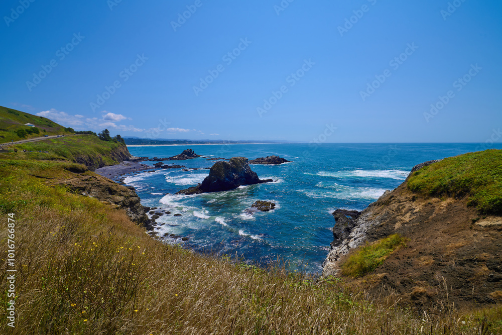 Rocky cliffs and the Marine Garden walls in the Yaquina Lighthouse Natural Area. Rocky cliffs and the Marine Garden walls in the Yaquina Lighthouse Natural Area.
