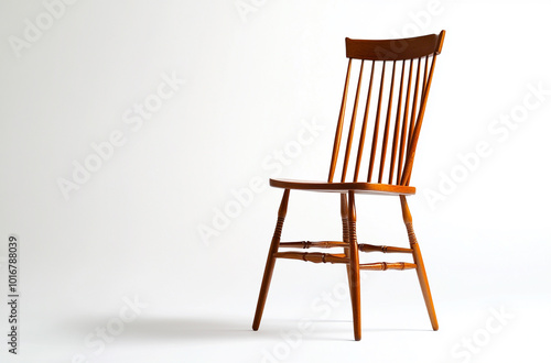 a wingback chair with high backrest and rolled arms