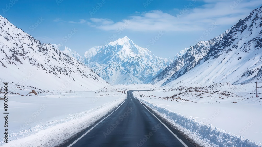 Snow-covered Karakoram Highway winding through a frozen mountain pass, Winter Karakoram, Cold, scenic, breathtaking Snow-covered Karakoram Highway winding through a frozen mountain pass, Winter Karakoram, Cold, scenic, breathtaking