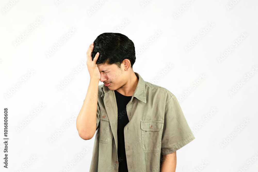 Worried Looking Young Handsome Male Boy with fingers crossed thinking and sad expressions lookg time Worried Looking Young Handsome Male Boy with fingers crossed thinking and sad expressions lookg time