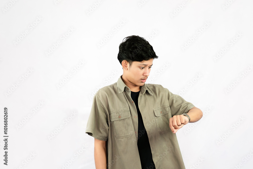 Worried Looking Young Handsome Male Boy with fingers crossed thinking and sad expressions lookg time Worried Looking Young Handsome Male Boy with fingers crossed thinking and sad expressions lookg time
