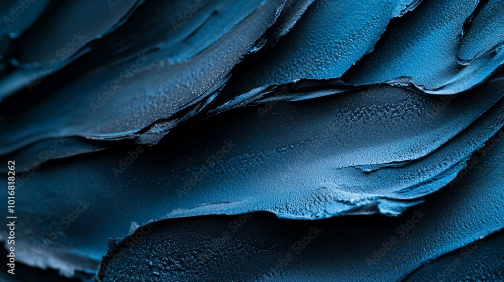 Obraz premium A tight shot of blue paint on an expansive artwork's canvas, evidently hand-painted