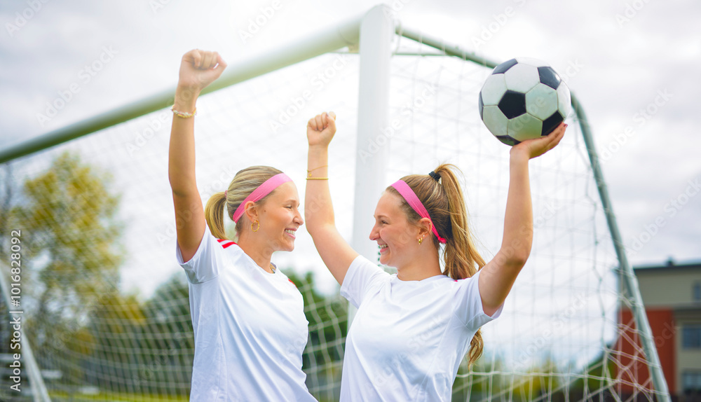 two soccer player friends with a football in a sport uniform wearing in white two soccer player friends with a football in a sport uniform wearing in white