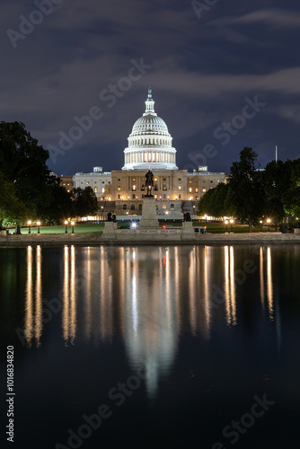 US Capitol building with reflection at night