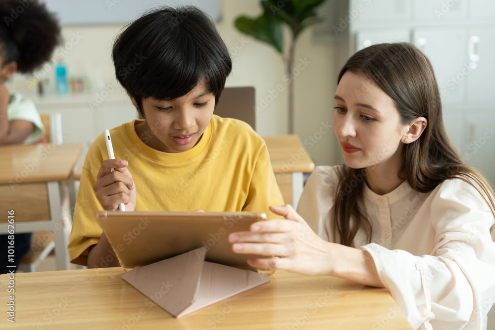 Teacher Guiding Student with Digital Learning in Diverse Classroom Teacher Guiding Student with Digital Learning in Diverse Classroom
