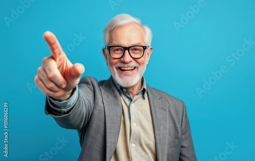 Smiling Senior Man Pointing Forward