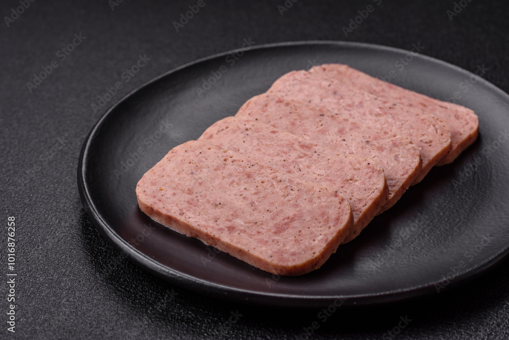 Delicious canned pink spiced ham or spam with salt, spices and herbs Delicious canned pink spiced ham or spam with salt, spices and herbs