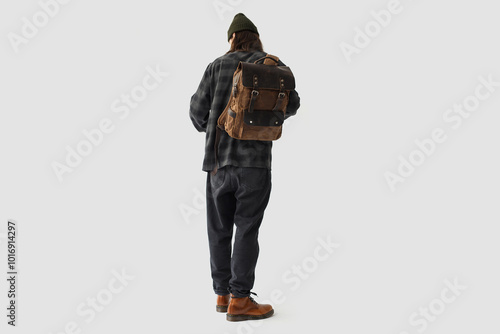 Photo of a guy with a backpack, view from the back
