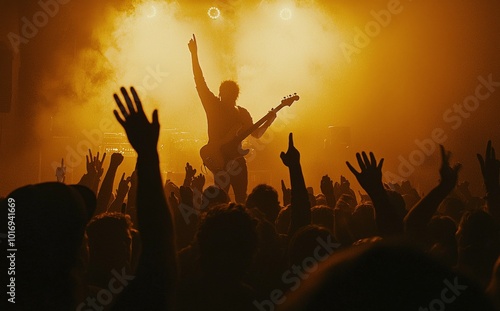 The crowd at a summer music festival in the middle of the city enjoyed a live concert under dazzling lights