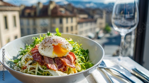 Fototapeta Naklejka Na Ścianę i Meble -  A bowl of salade Lyonnaise, with crisp bacon, poached egg, and frisee, set on a terrace overlooking the streets of Lyon