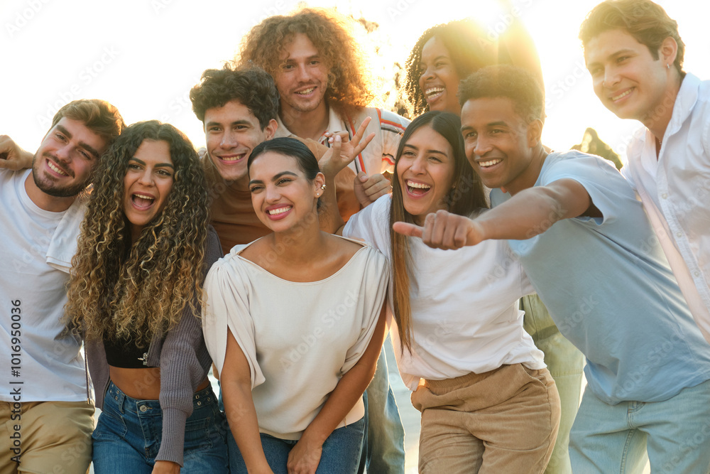 Group of friends is laughing and having fun together outdoors