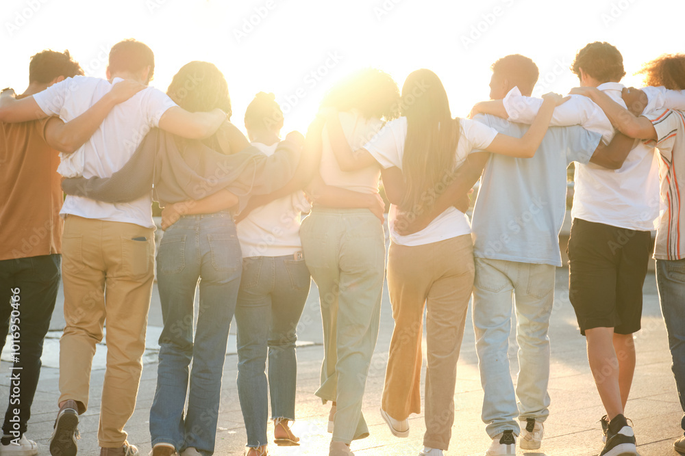 Group of students walking together in line with arms around each other's shoulders