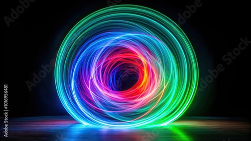 abstract light painting photography of green, violet, red, and blue circles and waves on black background