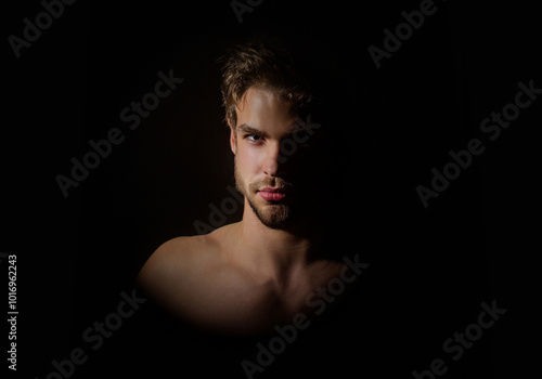 Handsome man with muscular topless body. Muscular torso. Strong brutal guy. Portrait of handsome athletic man. Muscular model. Handsome young man with naked body, bare torso, undressed. Sexy man.