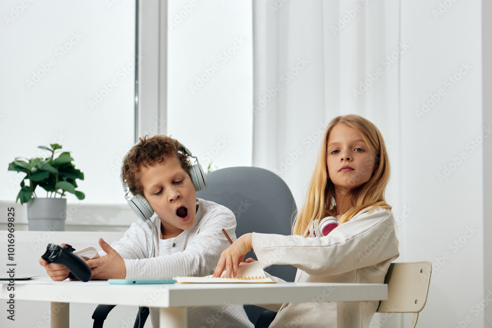 Happy Siblings Capturing Precious Moments Boy and Girl Enjoying Connected Online Lifestyle Two youngsters are sitting together, smiling and holding a smartphone, deeply engrossed in cyberspace, while Happy Siblings Capturing Precious Moments Boy and Girl Enjoying Connected Online Lifestyle Two youngsters are sitting together, smiling and holding a smartphone, deeply engrossed in cyberspace, while