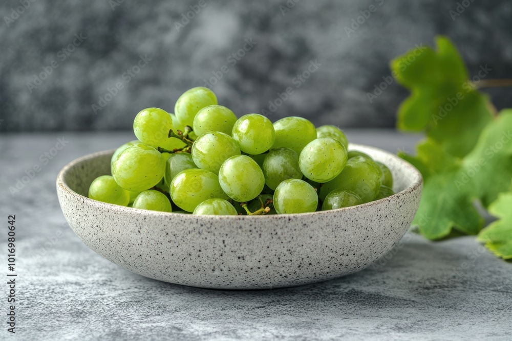 Vibrant Green Grape Delicacy on Concrete Bowl: Healthy Organic Dessert Vibrant Green Grape Delicacy on Concrete Bowl: Healthy Organic Dessert