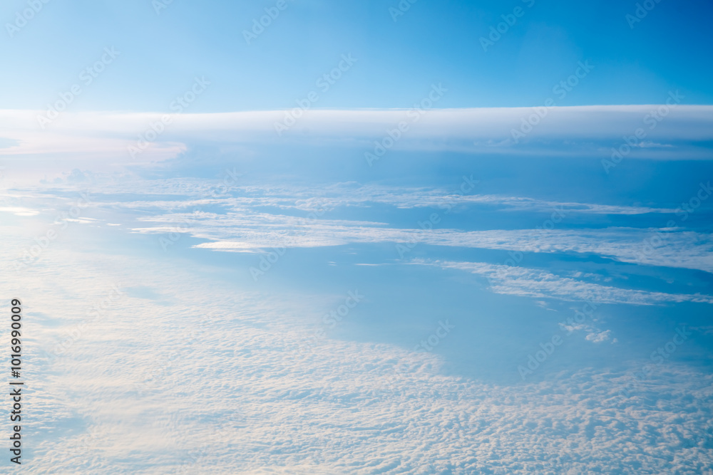 Top view of clouds, view from airplane, natural white background Top view of clouds, view from airplane, natural white background
