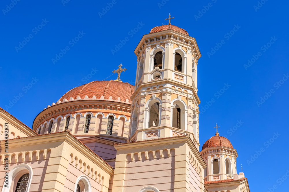 A large church with a blue sky in the background A large church with a blue sky in the background