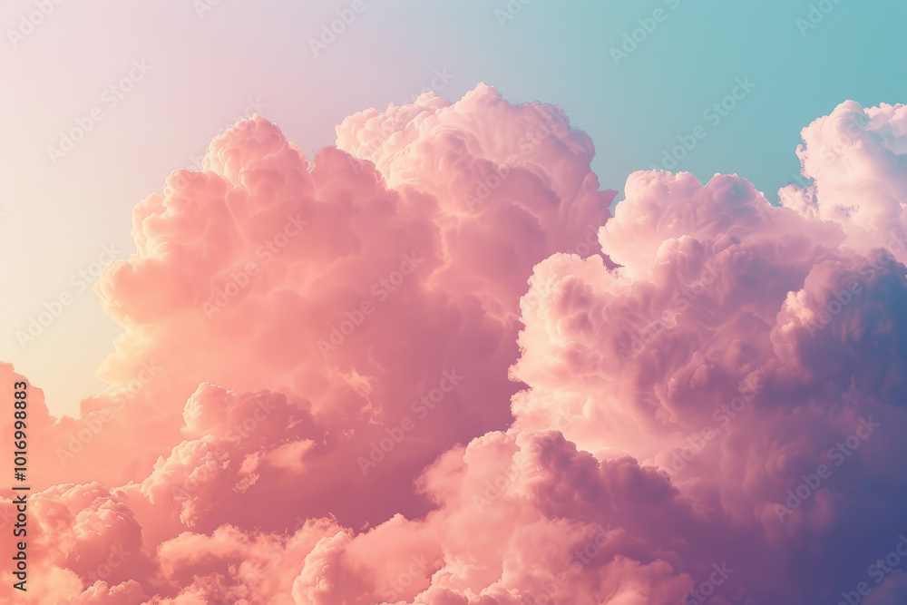 A pink cloud filled sky with a blue sky in the background A pink cloud filled sky with a blue sky in the background