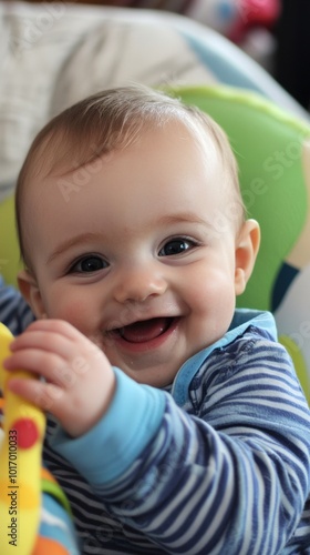 Joyful baby playing with a colorful toy in a cozy indoor setting during the day