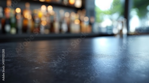 Wallpaper Mural A close-up of a bar counter with blurred bottles in the background. Torontodigital.ca