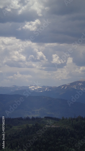 time clouds over the mountain