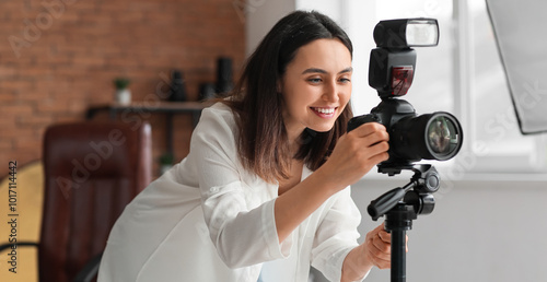 Female photographer with pr...