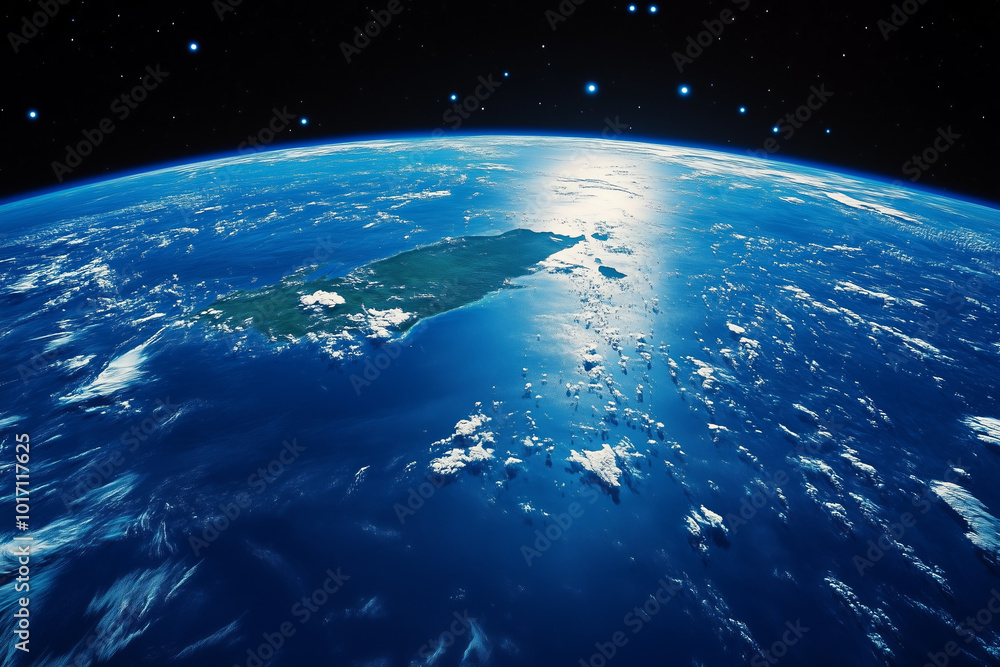 Obraz premium Earth from space with a sliver of land and white clouds.