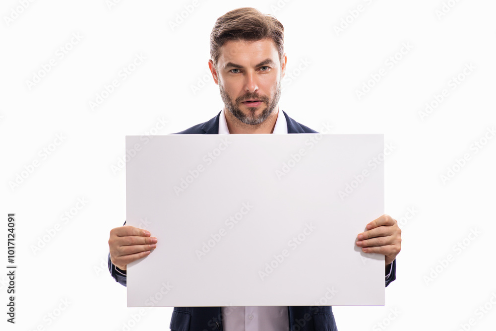 Serious man showing promo blank board on studio background. Blank signboard with copyspace. Advertisement concept. Ad board with copy space, blank mockup. Blank signboard, placard. Serious man showing promo blank board on studio background. Blank signboard with copyspace. Advertisement concept. Ad board with copy space, blank mockup. Blank signboard, placard.