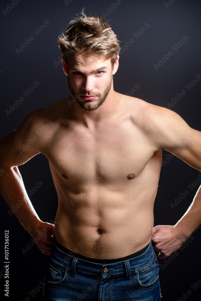 Fashion male model. Handsome man with topless body. Muscular model. Strong brutal guy. Portrait of handsome sport model. Handsome young man with naked body posing in studio. Sexy male model. Fashion male model. Handsome man with topless body. Muscular model. Strong brutal guy. Portrait of handsome sport model. Handsome young man with naked body posing in studio. Sexy male model.