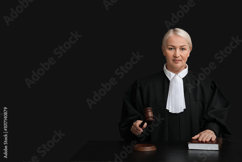 Mature female judge with ga...