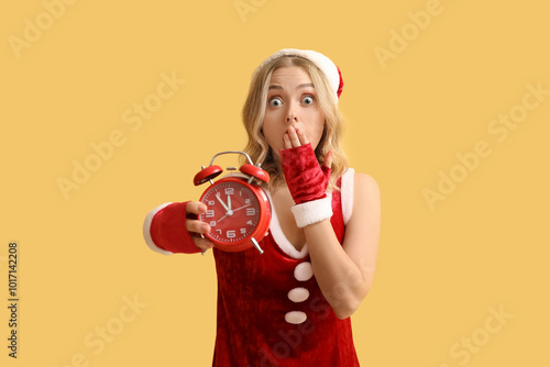 Shocked young woman dressed...
