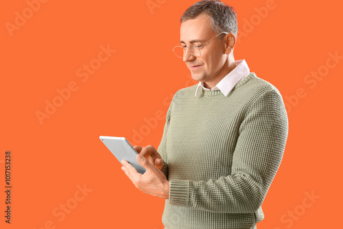 Mature man in eyeglasses us...