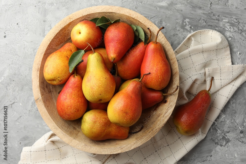 Ripe juicy pears on grey table, top view Ripe juicy pears on grey table, top view