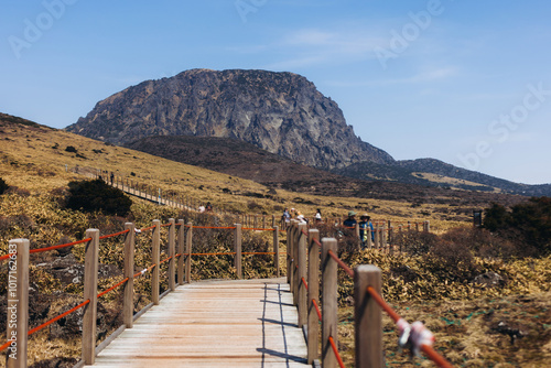 Hallasan National Park, Jeju island, South Korea, spring landscape view of Yeongsil trail, Halla volcano peak, trekking and climbing to Halla mountain, travel and hiking in Korea, Jeju-do, sunny day photo