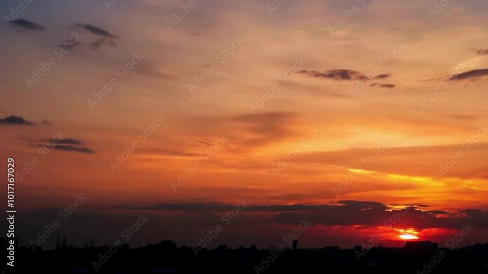 Beautiful Orange Sunset Casting a Warm Glow Across the Sky and Horizon Beautiful Orange Sunset Casting a Warm Glow Across the Sky and Horizon