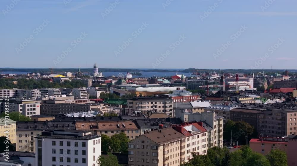 Helsinki cityscape with a view on the Baltic Sea, showing the urban landscape of the Finnish capital on a sunny summer day Helsinki cityscape with a view on the Baltic Sea, showing the urban landscape of the Finnish capital on a sunny summer day
