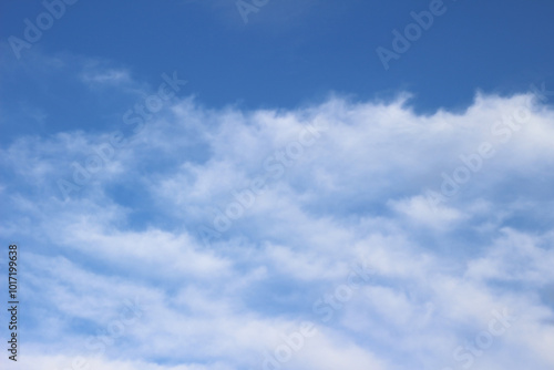 Bright blue sky with clouds