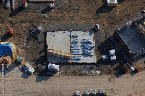 Aerial view of UK house construction in the building industry, housing crisis, sustainable future