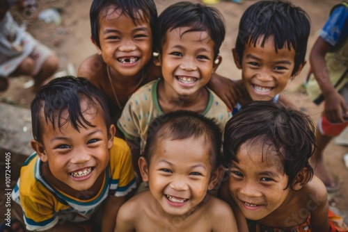 Group of happy asian kids on the floor in the village.