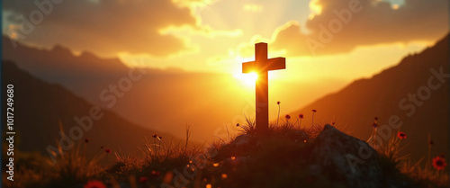 Silhouetted christian cross silhouette on the mountain at sunset