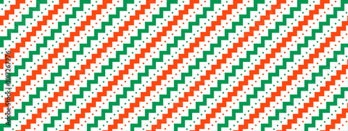 Christmas seamless pattern. Red and green diagonal zigzag and dots stripe background. Candy cane repeating decor wallpaper. Christmas peppermint present wrap print. Vector winter holiday gift backdrop