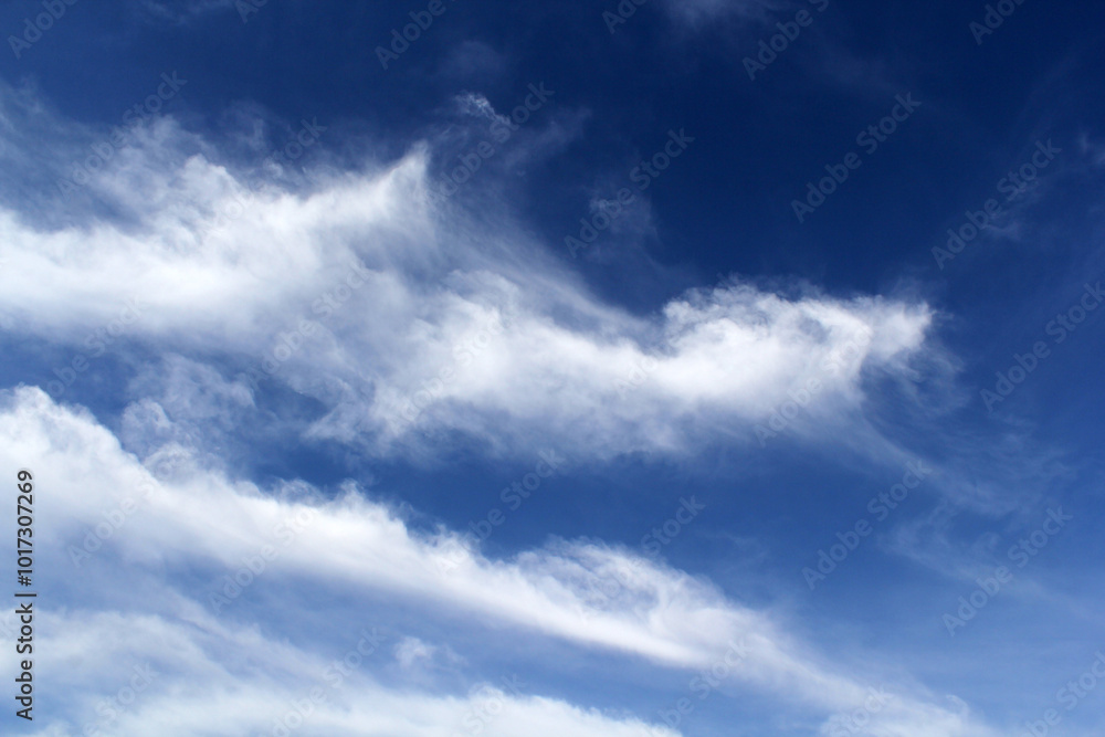 Blue sky with wispy white clouds Blue sky with wispy white clouds