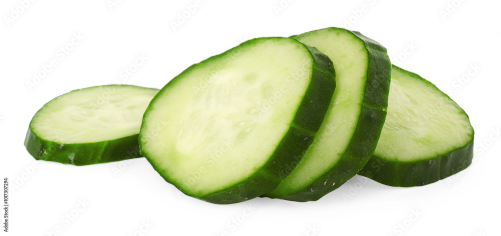 Slices of fresh cucumber isolated on white Slices of fresh cucumber isolated on white
