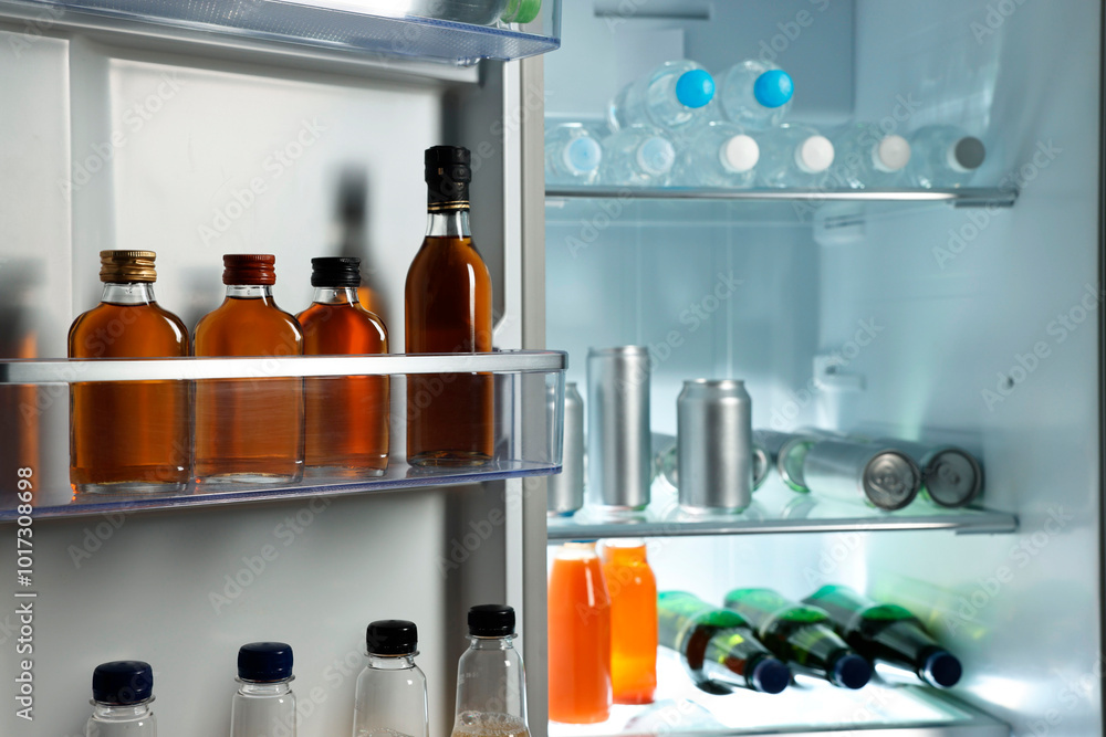 Many different cold drinks in refrigerator, closeup Many different cold drinks in refrigerator, closeup